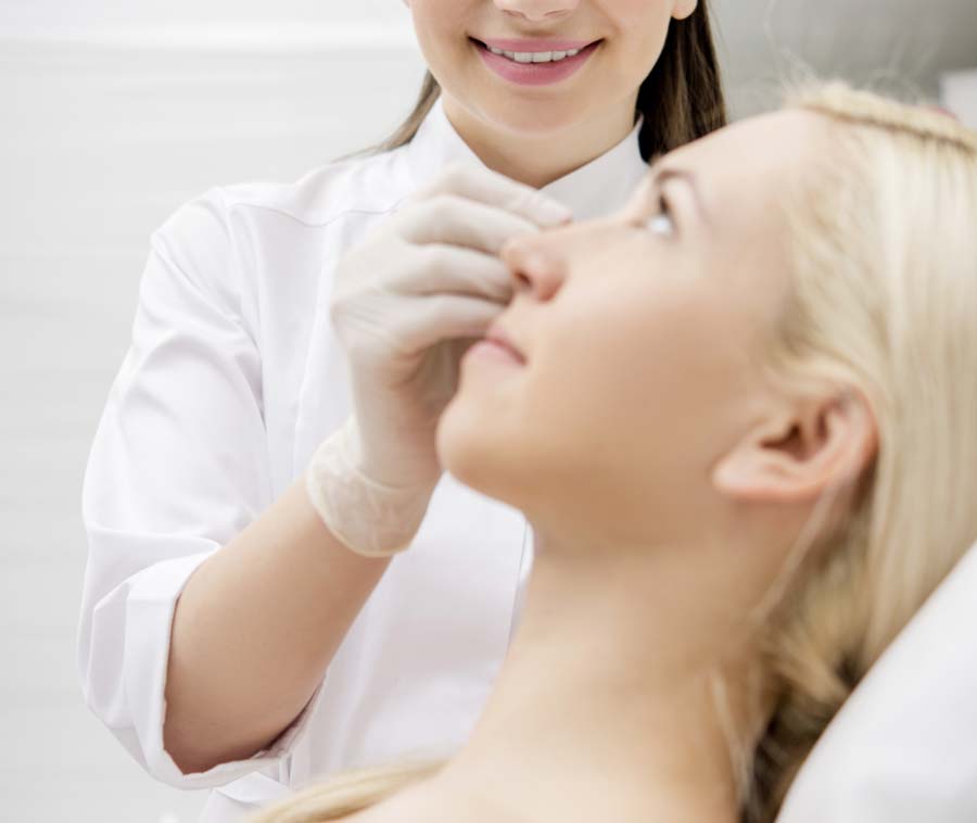 Photo of a woman undergoing esthetic treatments