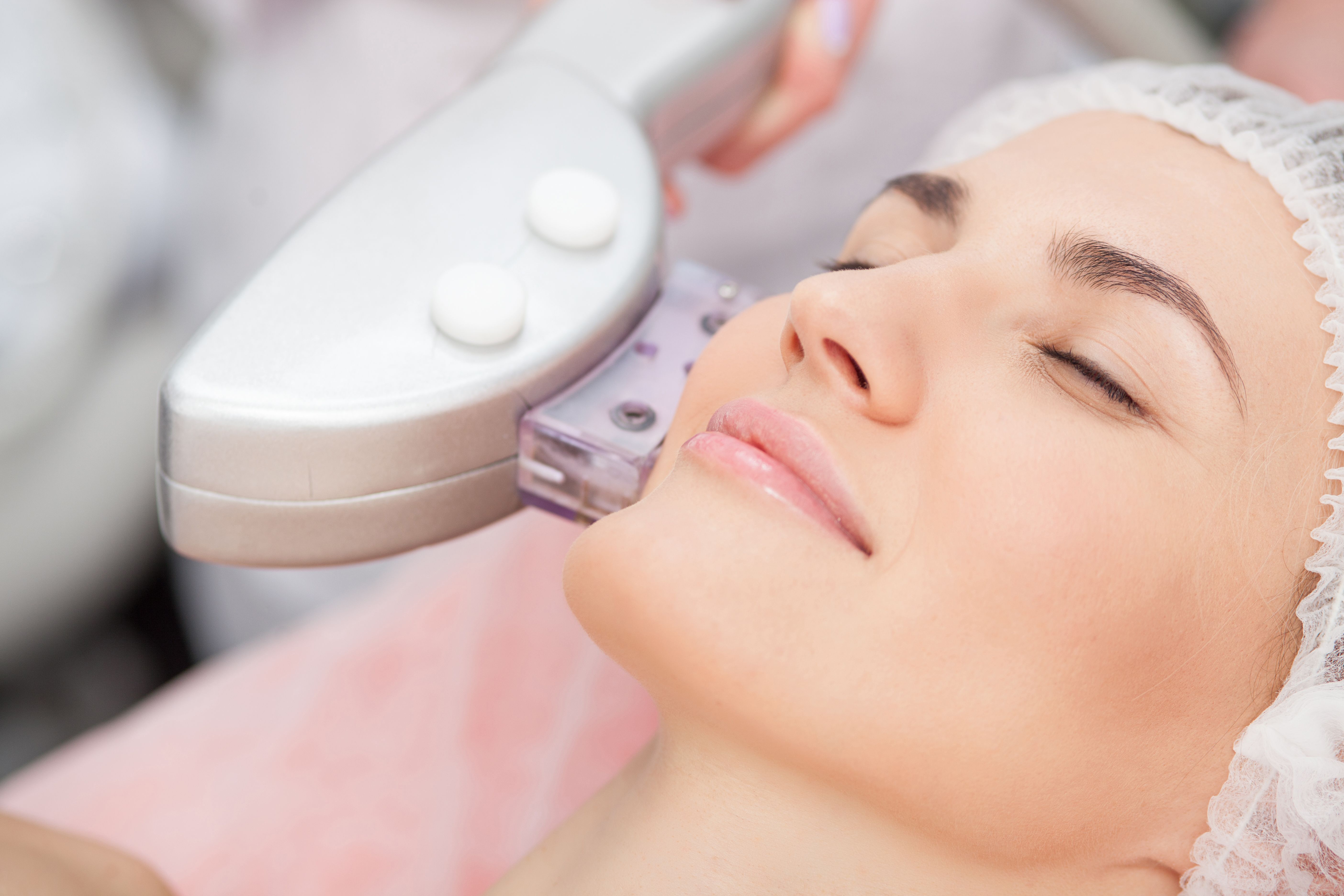 A woman undergoing Laser Genesis™ treatment